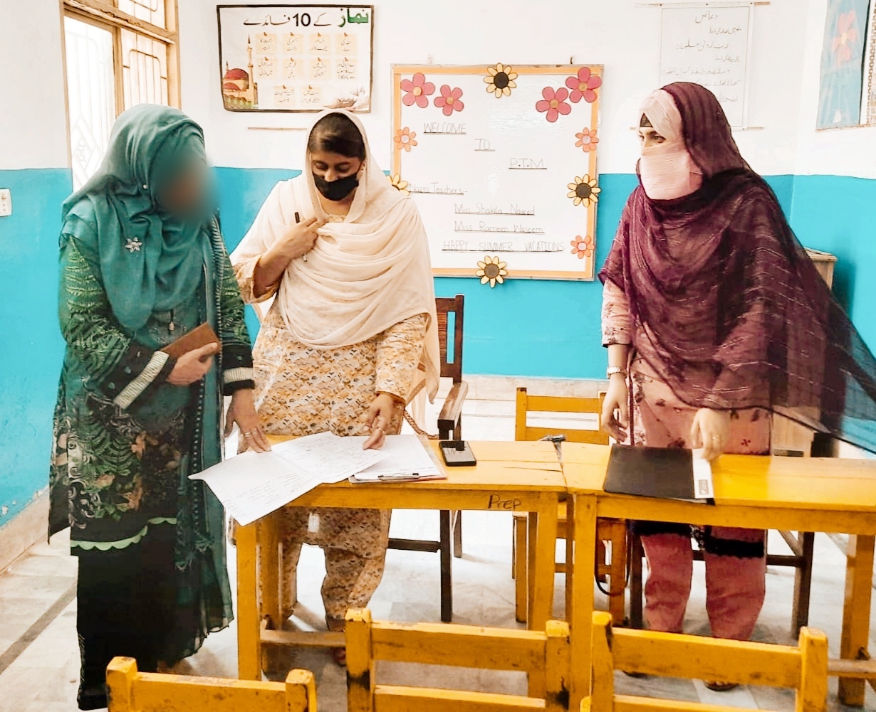 Parents and teachers meeting in class