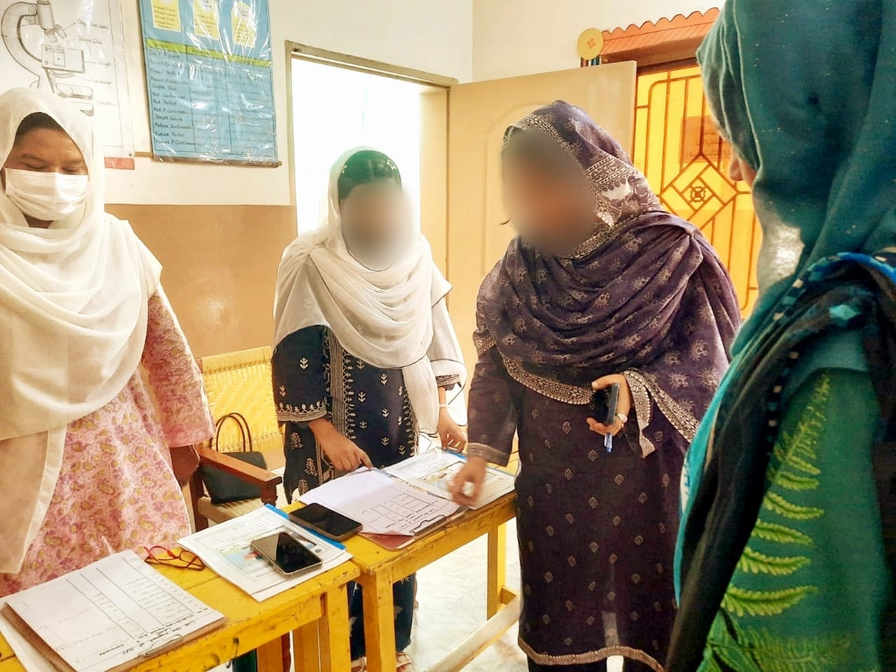 Respected Maam Principal reviewing comment list on PTM